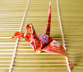 Image showing Origami On A Bamboo Floor