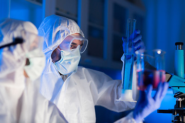 Image showing close up of scientists making test in lab