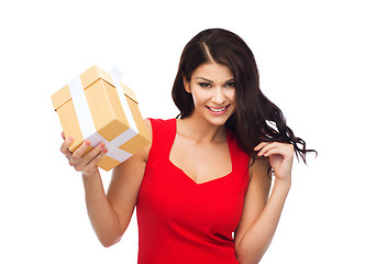 Image showing beautiful sexy woman in red dress with gift box