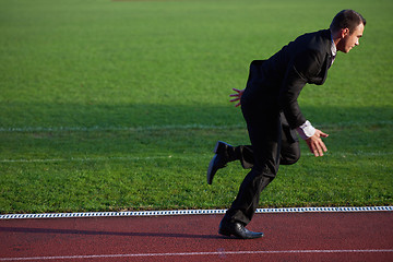 Image showing business man ready to sprint