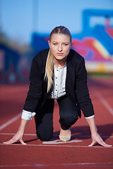 Image showing business woman ready to sprint