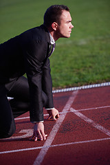 Image showing business man ready to sprint