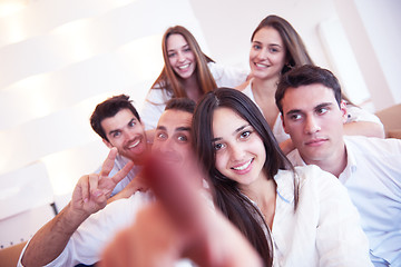 Image showing group of friends taking selfie