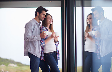 Image showing relaxet young couple drink first morning coffee