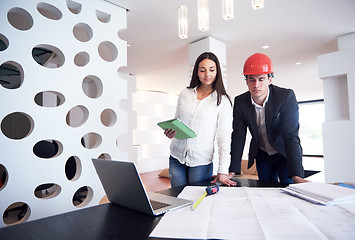 Image showing couple buying new home with real estate agent