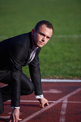 Image showing business man ready to sprint