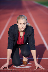 Image showing business woman ready to sprint