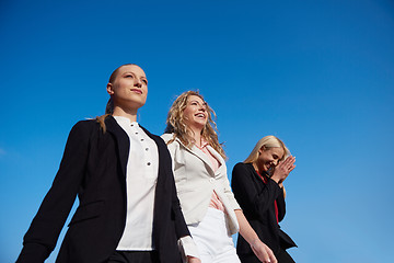 Image showing business people running on racing track