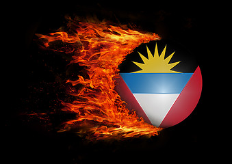 Image showing Flag with a trail of fire - Antigua and Barbuda