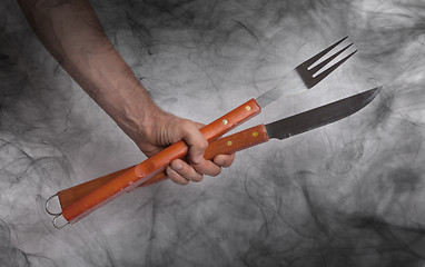 Image showing Hand hold of BBQ equipment