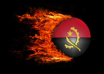 Image showing Flag with a trail of fire - Angola