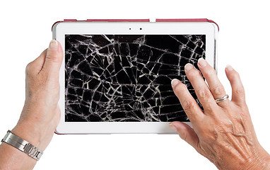 Image showing Senior lady with tablet, cracked screen