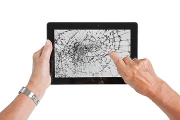 Image showing Senior lady with tablet, cracked screen