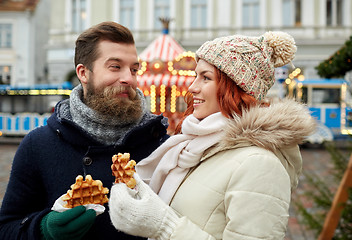 Image showing happy couple walking in old town