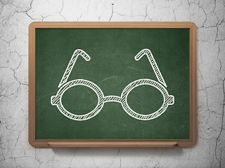 Image showing Science concept: Glasses on chalkboard background