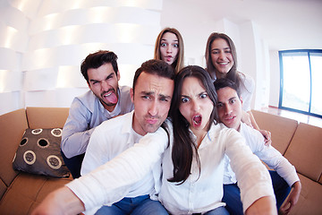 Image showing group of friends taking selfie