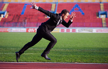 Image showing business man ready to sprint