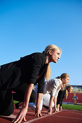 Image showing business woman ready to sprint