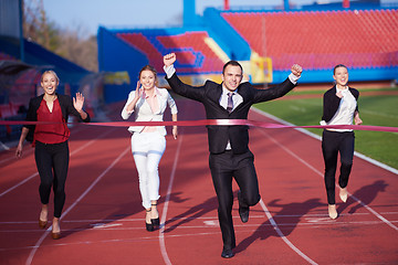 Image showing business people running on racing track