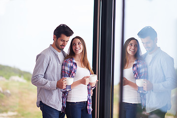 Image showing relaxet young couple drink first morning coffee