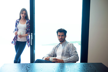 Image showing relaxet young couple drink first morning coffee