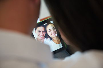 Image showing couple at modern home using tablet computer