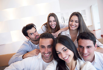 Image showing group of friends taking selfie