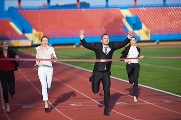 Image showing business people running on racing track