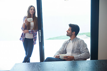 Image showing relaxet young couple drink first morning coffee