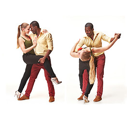 Image showing Young couple dances Caribbean Salsa, studio shot