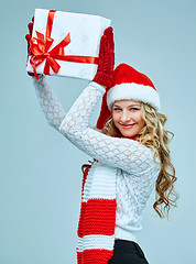 Image showing Beautiful young woman in Santa Claus clothes