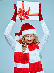 Image showing Beautiful young woman in Santa Claus clothes