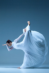 Image showing Portrait of the ballerina on blue background