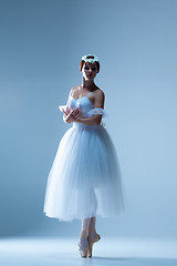 Image showing Portrait of the ballerina on blue background