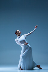 Image showing Portrait of the ballerina on blue background