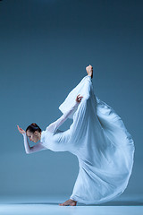 Image showing Portrait of the ballerina on blue background