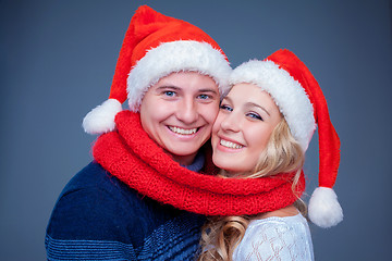 Image showing Lovely christmas couple in Santa Claus hats