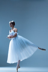 Image showing Portrait of the ballerina on blue background