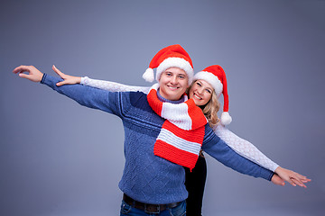 Image showing Lovely christmas couple in Santa Claus hats