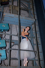 Image showing The beautiful ballerina posing in long white skirt 