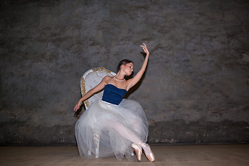 Image showing The beautiful ballerina posing in long white skirt 