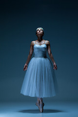 Image showing Portrait of the ballerina on blue background