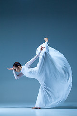 Image showing Portrait of the ballerina on blue background