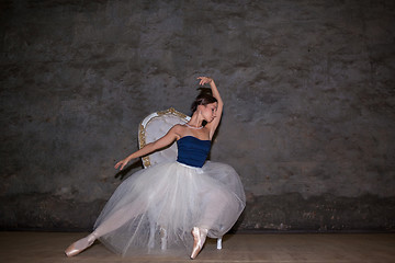 Image showing The beautiful ballerina posing in long white skirt 