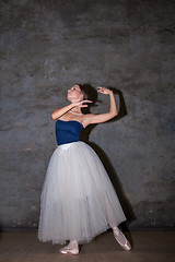 Image showing The beautiful ballerina posing in long white skirt 