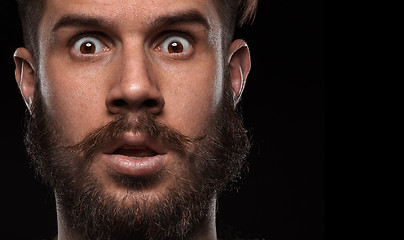 Image showing Close-up portrait of amazed guy 