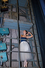 Image showing The beautiful ballerina posing in long white skirt 