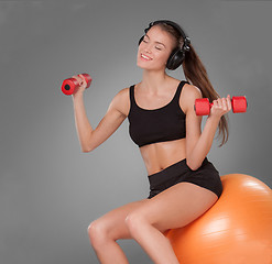 Image showing Sporty woman doing aerobic exercise 