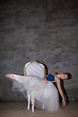 Image showing The beautiful ballerina posing in long white skirt 