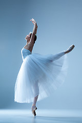 Image showing Portrait of the ballerina on blue background